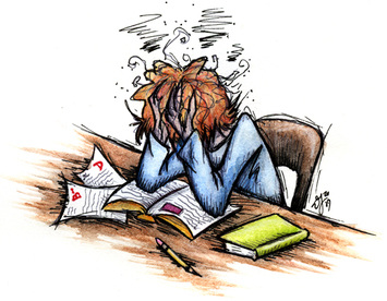 Picture of a person sitting at desk with head buried in hand at a desk filled with work.